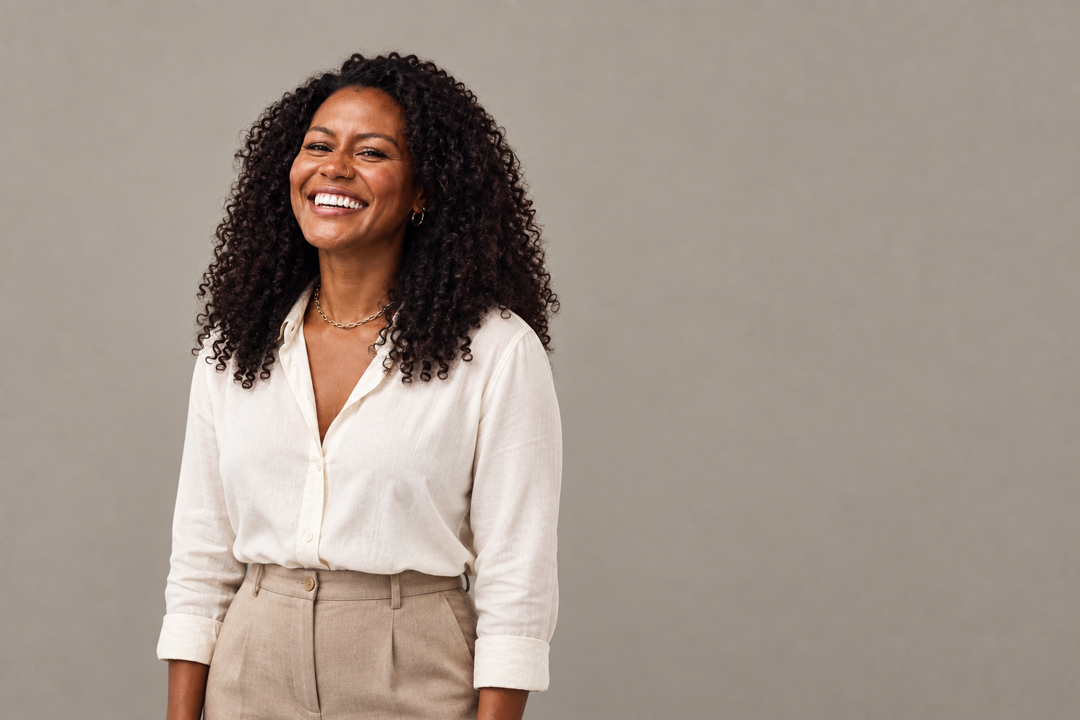 Editorial portrait illustration of Janai Norman smiling in an ivory blouse against a warm-grey background.