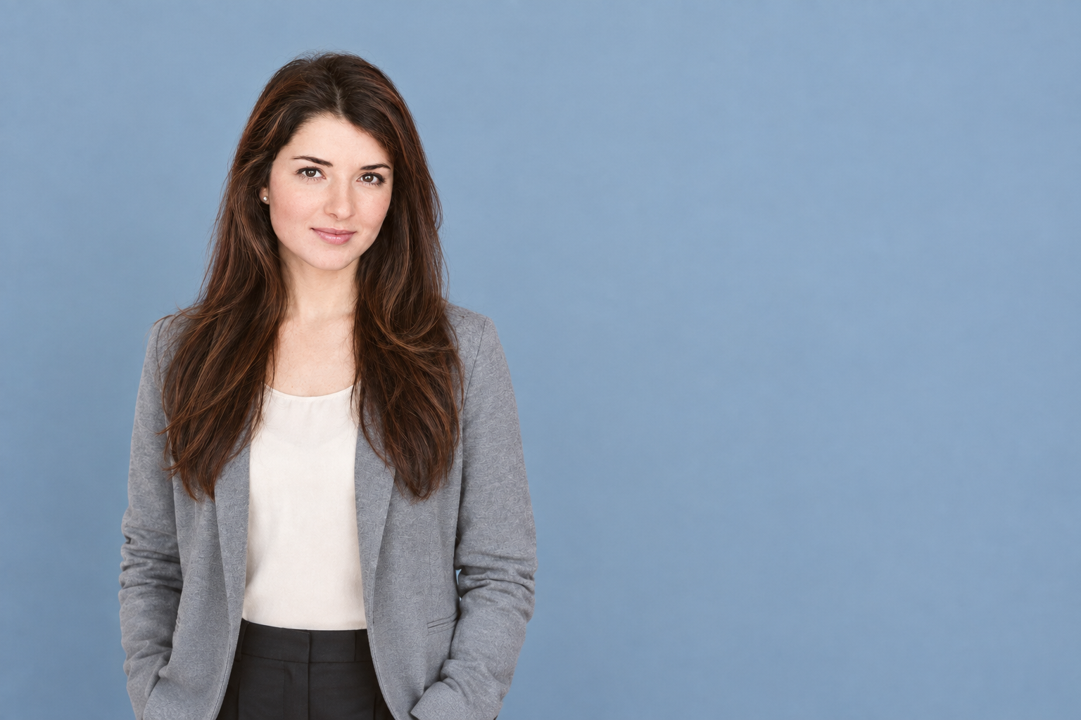 Editorial portrait illustration of Kristine Saryan in a grey jacket and cream top against a blue-grey background.